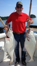 ralph grant with his halibut with Hot Pursuit Charters